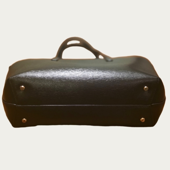 DKNY Bryant Medium Zippered Tote Bag in black leather with gold-tone hardware.  - Picture 7 of 17